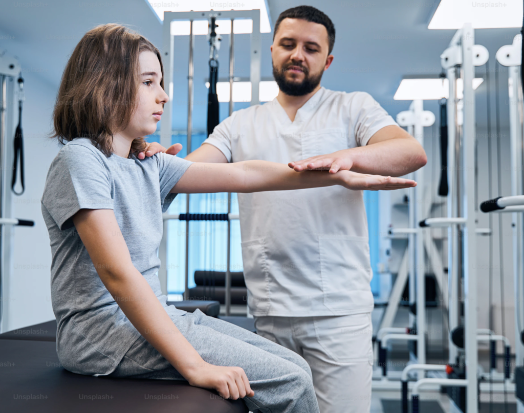 chiropractor helping a girl child