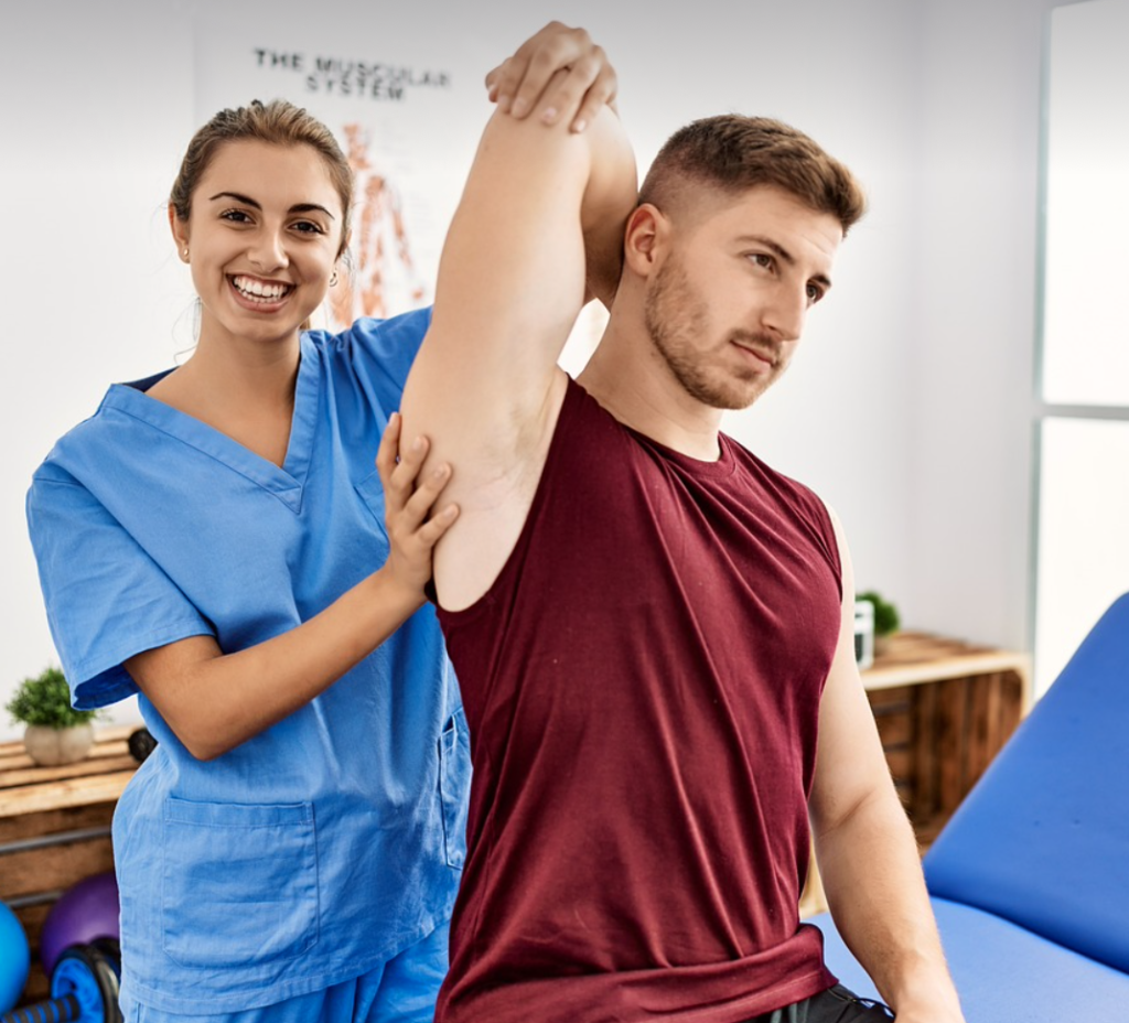 chiropractor helping a young boy